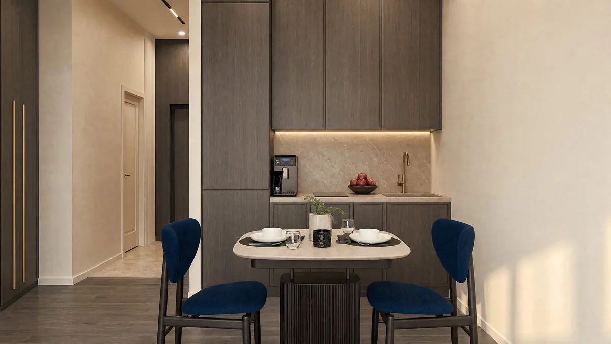 A kitchen with a dining table