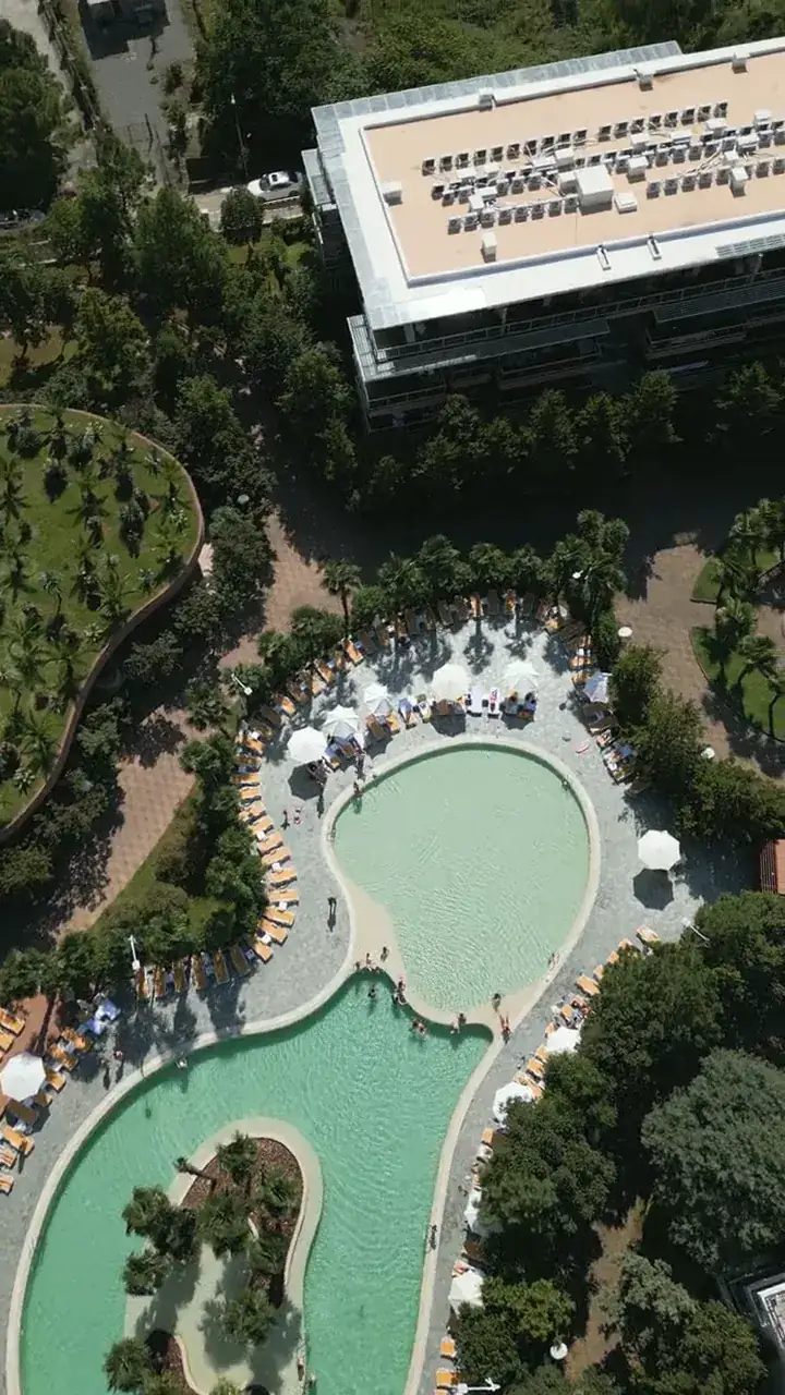 The pools of the resort from straight above